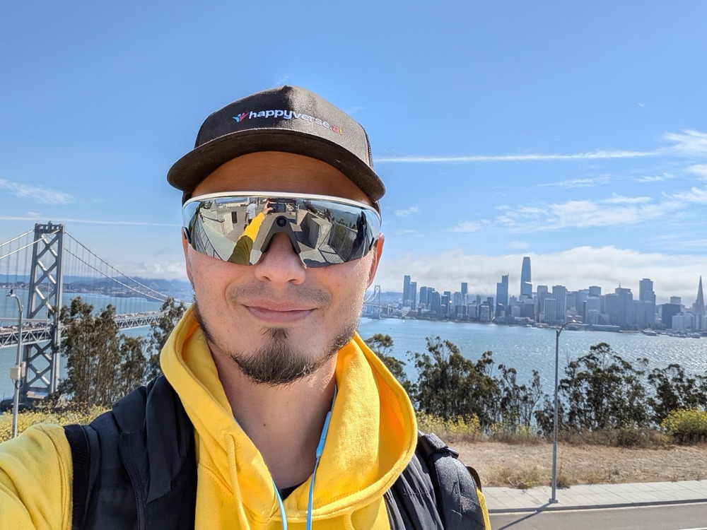 Max at Treasure Island with the Bay Bridge and San Francisco skyline behind